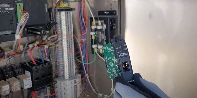 MyVends hardware being connected to an ice vending machine control panel